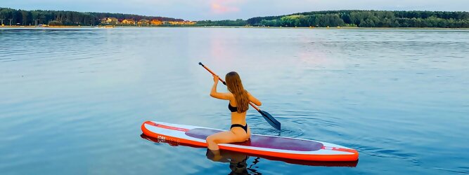 Trip Urlaubsreif - Wassersport mit Balance & Technik vereinen | Stand up paddeln, SUPen, Surfen, Skiten, Wakeboarden, Wasserski auf kristallklaren Bergseen